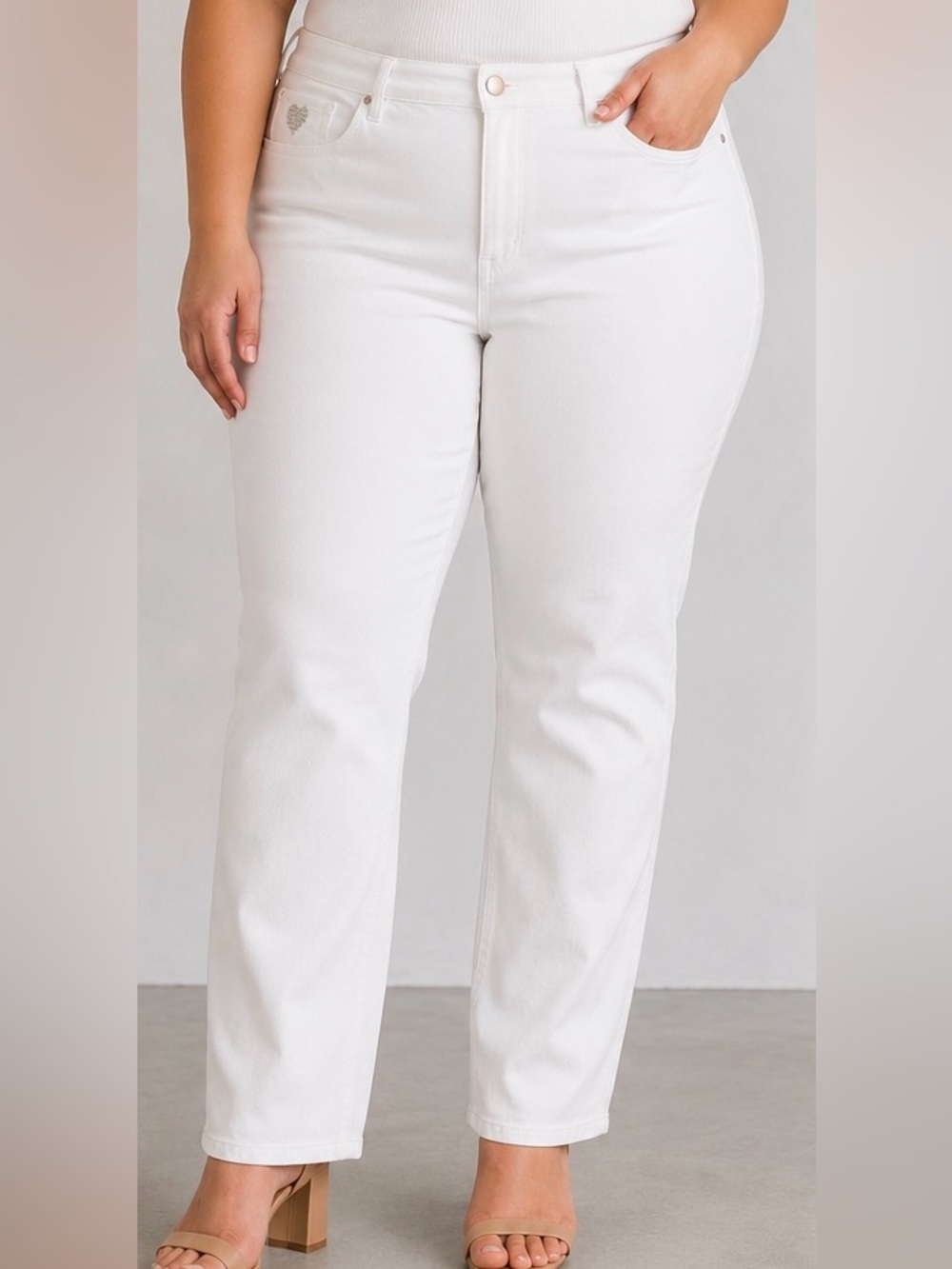 White jeans w/rhinestone signature heart Size 28W. 96% Cotton. Nice heavy cotton